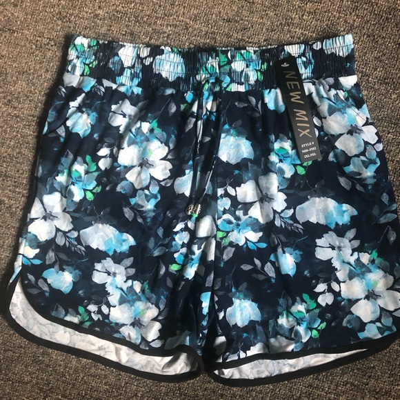 Pants - Blue floral dolphin shorts with pockets